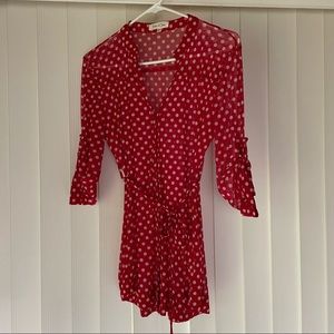 Red and white polka dot button down blouse with tie size medium